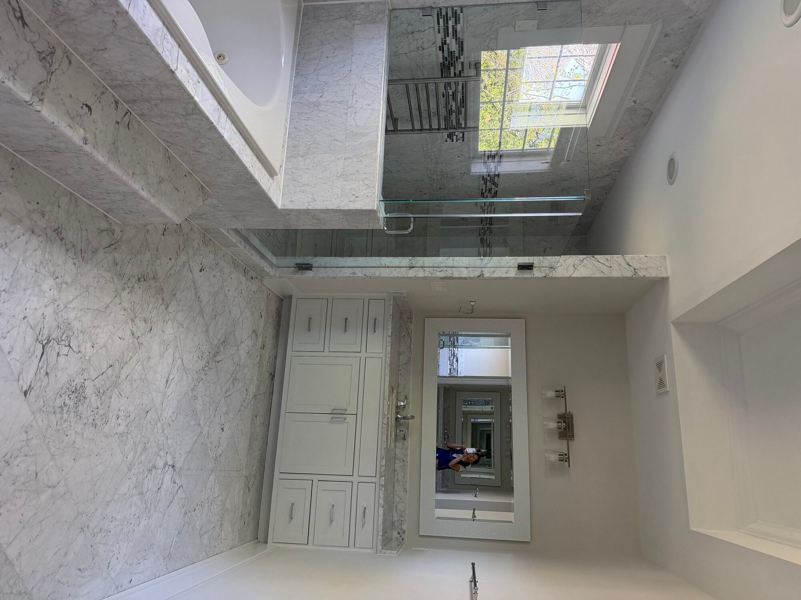 Sparkling marble bathroom after deep cleaning service in Arlington VA